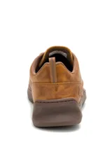 Championes Caterpillar modelo Flexion Lo para hombre, confeccionados en cuero marrón con suela de goma estructurada y cordones al tono.