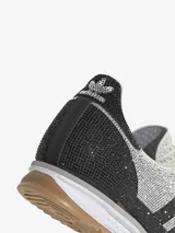 Championes Adidas modelo SL 72 OG, con diseño de cristales incrustados en tonos negro y plateado. Presenta las icónicas tres bandas laterales, suela de goma dentada y puntera reforzada.