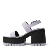 Sandalias con plataforma color lila, con dos tiras anchas y hebilla de ajuste al tobillo.