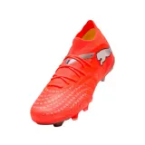 Championes de fútbol Puma Future 9 Match FG/AG, color naranja vibrante con detalles en plateado. Diseño de corte medio con tecnología de ajuste avanzado y suela especializada para tracción en césped natural y artificial.