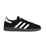 Championes Adidas modelo Handball Spezial, de diseño clásico con exterior de gamuza negra, tres bandas laterales blancas y suela de goma color caramelo. Incluye el nombre del modelo en letras doradas en el lateral.