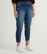 Pantalón skinny de jean azul, tiro alto, con detalles de desgastes y terminación de barra deshilachada. Cuenta con bolsillos y cierre frontal.