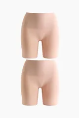 Pack de dos culottes tipo biker moldeadores de tiro alto, confeccionados en tejido elástico seamless con sujeción media en cintura, caderas y glúteos.