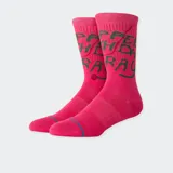 Medias Stance Happee Crew color rosa con diseño estampado en verde.