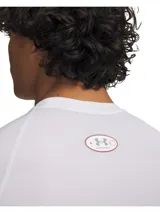 Remera térmica Under Armour HeatGear Elite Comp de manga corta, color blanco, con diseño ajustado de compresión y cuello redondo.