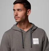 Buzo con capucha Columbia, color gris jaspeado, con bolsillo tipo canguro frontal y parche cuadrado con logo de la marca en el pecho.
