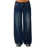 Pantalón de jean Rip Curl modelo Archive Baggy Low Rise, de tiro bajo y corte ancho, color azul con efecto deslavado.