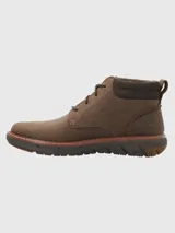 Bota de cuero marrón con ajuste de cordones, cuello acolchado de tejido técnico y suela tecnológica Spinal Flex de alta amortiguación.