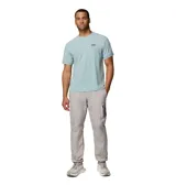 Pantalón cortavientos Columbia Challenger Windbreak Omni-Shield en color gris con paneles laterales en verde oliva y marrón, con dobladillo ajustable mediante cordón elástico.