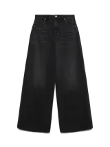 Jean wide leg de tiro medio con efecto lavado, confeccionado en denim de sarga. Presenta un diseño clásico de cinco bolsillos con cierre de botón y cremallera, con pierna ancha y estructura suelta.