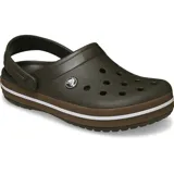Zuecos Crocs modelo Crocband Clog Gum, color negro con banda lateral en tono caramelo y línea blanca. Diseño con orificios de ventilación, tira trasera pivotante y suela cómoda de espuma Croslite.