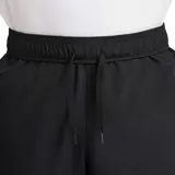 Pantalón deportivo Nike Form de corte relajado, confeccionado en tejido ligero con tecnología absorbente de sudor. Presenta cintura elástica, bolsillos laterales prácticos y el logo de la marca bordado en la pierna.