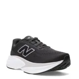 Championes de running New Balance modelo Kaiha, color negro con entresuela blanca y detalles en gris. Presentan una parte superior de malla transpirable y el logo N característico en el lateral.