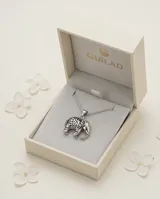 Dije de plata 925 con diseño de elefante calado con detalles ornamentales.