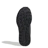 Championes de trekking Adidas Terrex Anylander, color negro, con diseño de malla transpirable y refuerzos sintéticos. Presentan suela con relieve para mayor tracción y logo Terrex en la lengüeta y el talón.