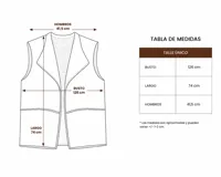 Chaleco de cuero sintético negro con interior de corderito sintético color crema. Diseño sin mangas, con cuello amplio y terminaciones al corte.