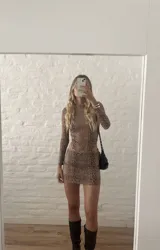 Body de microtul con estampado animal print en tonos marrones.