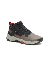 Calzado de trekking Caterpillar modelo Grapple Leather Mid, color gris con detalles en negro, rojo y suela bicolor.