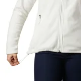 Campera polar Columbia modelo Fast Trek II, color blanco, con cierre frontal completo, cuello alto y bolsillos laterales con cierre. Incluye un bolsillo adicional con cierre en la manga izquierda y logo de la marca bordado en el pecho.