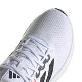 Championes Adidas Runfalcon 3.0 de hombre, color blanco con detalles en negro, gris y naranja. Capellada de malla transpirable, entresuela Cloudfoam y suela de goma.