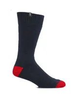 Medias de largo medio en color azul marino, con talón y puntera en color rojo contrastante. Presentan un diseño de tejido liso con puño elástico suave.