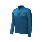 Campera azul con cierre y cuello alto, con el escudo del FC Barcelona en el pecho y una franja negra en la manga.