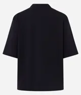 Remera de algodón Marfinno con corte boxy, cuello redondo y mangas cortas amplias, de diseño liso y holgado.