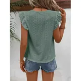 Blusa de tela broderie color negro, con cuello redondo, mangas cortas con volados y detalle de calado horizontal en la parte superior del pecho.