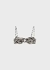Top de bikini con diseño de aro, estampado animal print de cebra y tirantes finos ajustables.