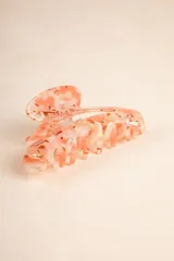 Broche para el pelo con estampado multicolor.