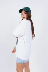 Remerón negro con estampado fotográfico en blanco y negro de Beyoncé con sombrero de cowboy.