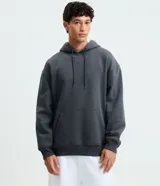 Hoodie de algodón con felpa color gris oscuro, corte comfort, capucha con cordón ajustable, bolsillo tipo canguro y puños y dobladillo acanalados.