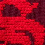 Sweater de punto Supreme en color bordó, con diseño de punto cruzado y grandes letras rojas formando la marca en la parte frontal y las mangas. Cuenta con cuello redondo y ajuste regular.
