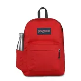 Mochila JanSport Superbreak roja con logo de la marca en el frente, bolsillo frontal con cierre y bolsillo lateral para botella.