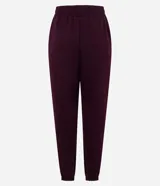 Pantalón jogger de corte holgado, confeccionado en tejido fleece color beige. Presenta cintura elástica, bolsillos laterales y puños ajustados en el bajo.