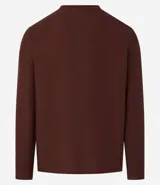 Remera de manga larga con cuello redondo y textura acanalada, confeccionada en una mezcla de poliéster y algodón.