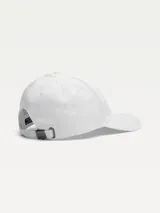 Gorra de béisbol blanca de algodón con logo de Tommy Hilfiger bordado en el frente y hebilla metálica ajustable en la parte trasera.