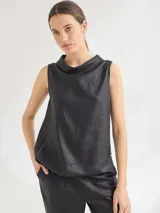 Top sin mangas de corte holgado, con cuello tipo polera drapeado y cierre lateral decorativo. Confeccionado en una mezcla de viscosa y lino con acabado satinado.
