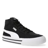 Championes urbanos Puma Court Classic Vulc Mid FS de caña media, confeccionados en lona negra con la icónica franja lateral en blanco. Presentan cierre de cordones, suela vulcanizada blanca con detalles en negro y logo de la marca en el lateral y la lengüeta.
