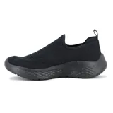 Championes de estilo casual marca Actvitta, confeccionados en tejido de punto negro con diseño sin cordones y suela de goma texturizada.