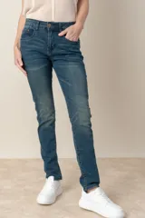 Pantalón de jean azul de corte ajustado, con efecto gastado y cinco bolsillos.