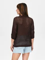 Buzo de punto calado color verde lima, con escote en V y mangas 3/4.