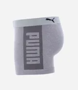 Calzoncillo tipo bóxer para hombre, color gris jaspeado, confeccionado en poliamida y elastano. Presenta cintura elástica de color gris claro con el logo PUMA en negro.