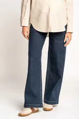 Pantalón de jean azul oscuro, corte wide leg, tiro medio, para embarazadas.
