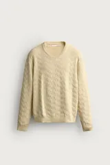 Jersey de punto regular fit color beige, con cuello redondo y diseño de textura geométrica en zigzag.