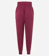 Pantalón de jogging deportivo azul con cintura ajustable con cordón, bolsillos laterales y tobillos ajustados.