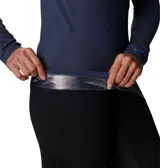 Primera capa de manga larga Columbia, color azul marino, con tecnología de reflectividad térmica Omni-Heat y tejido absorbente Omni-Wick. Presenta un ajuste ergonómico con costuras contorneadas y elasticidad en cuatro direcciones.