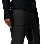 Pantalon de trekking Columbia modelo Whistler Peak Pant, de color negro con detalles reflectantes, impermeable y transpirable con tecnología OutDry Extreme y costuras selladas. Cuenta con cremalleras laterales bidireccionales, cintura ajustable y refuerzos resistentes en la parte inferior.