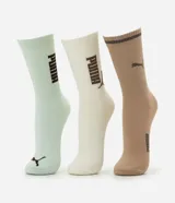 Kit de tres pares de medias de caña alta Puma en tonos verde menta, beige y marrón, confeccionadas en algodón con detalles de logo y lettering en contraste.
