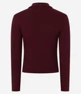 Blusa de manga larga confeccionada en tejido rib de algodón con cuello polo y escote en V. Presenta un diseño ajustado al cuerpo y acabado liso.